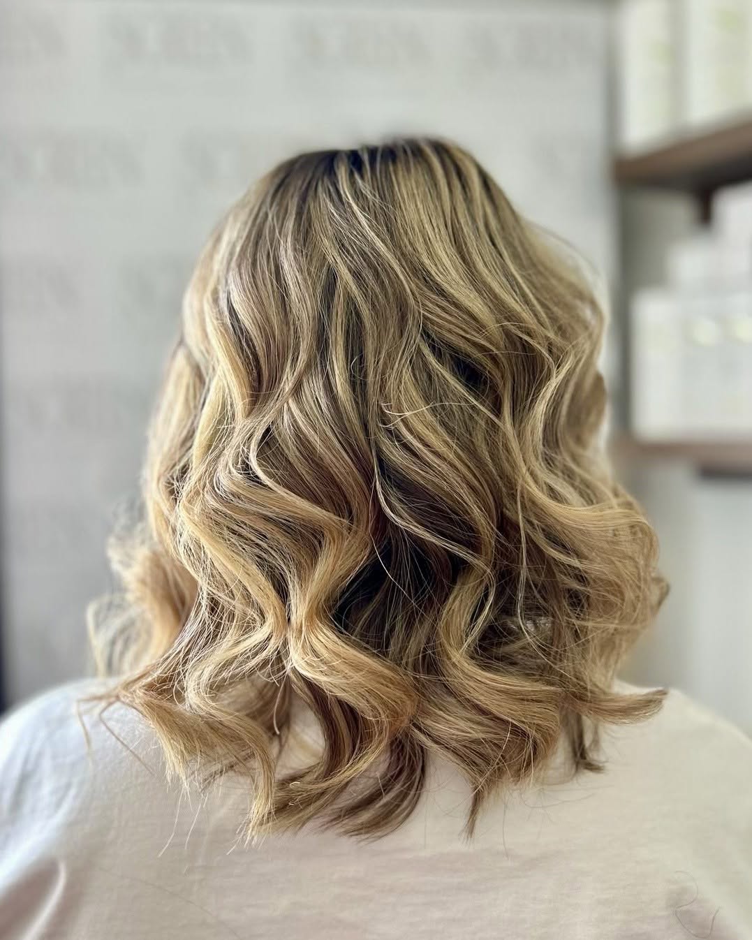 Soft blonde balayage waves at Screen Salon Bugibba